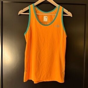 The Northface flash dry women’s bright orange lightweight tank top size small